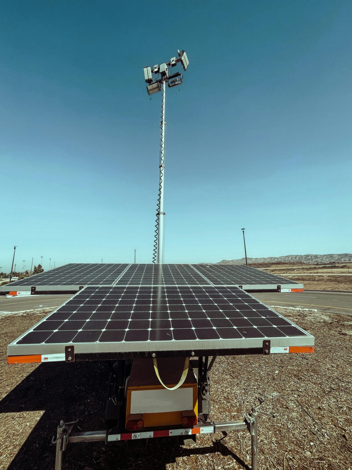 Renewable energy solar panels in a sunny California landscape, highlighting sustainable power.